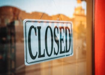 A photo of a closed sign. Evan Wise/ Unsplash