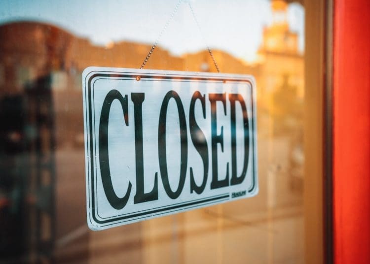 A photo of a closed sign. Evan Wise/ Unsplash