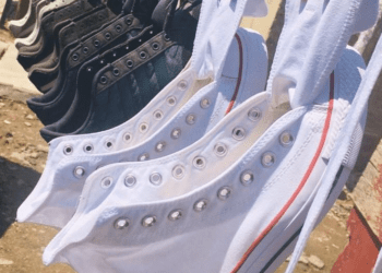 Takalani Matamela's business Shoe Shine Experts refurbishes takes.