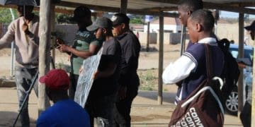 Sidwell Tshepo Nare with his colleagues when making their film called Ke Maemo. Picture :Mukurukuru Media.