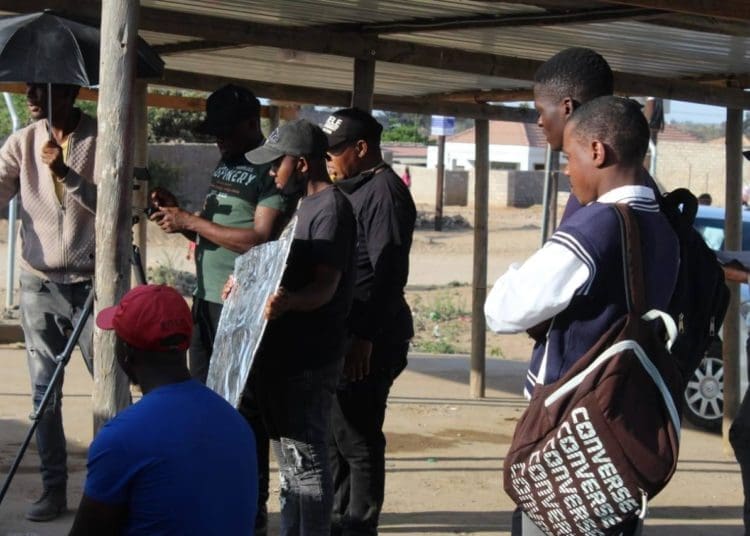 Sidwell Tshepo Nare with his colleagues when making their film called Ke Maemo. Picture :Mukurukuru Media.
