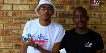 Phathutshedzo Netshimboni, on the left with a friend at the launch of his condoms. Picture : Tebogo Mokwena