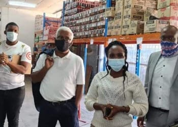 Economic Development and Environmental Affairs MEC Ravi Pillay with his officials inspecting businesses for compliance