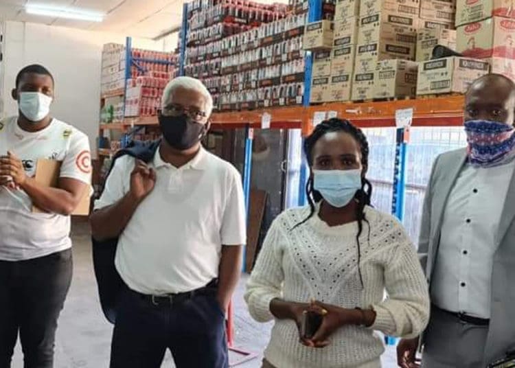 Economic Development and Environmental Affairs MEC Ravi Pillay with his officials inspecting businesses for compliance