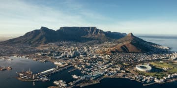 Aerial coastal view of cape town city with table mountain, cape town harbour, lions head and devils peak, South africa.