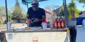 Tiyani Maluleke making his delicious burgers
