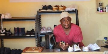 Lutendo Tshikovhi whose business is cleaning sneakers