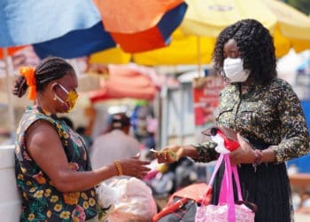 Street vendor selling to her customers