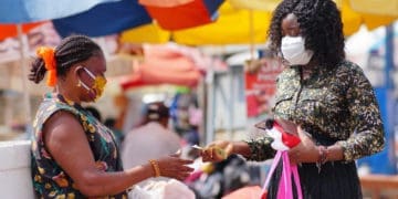 Street vendor selling to her customers