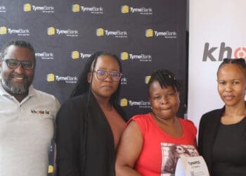 Khona La Local Stores founder Mxolisi Buthelezi and his team