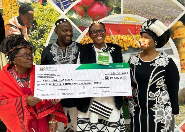 Kholisa Dabula surrounded by other farmers