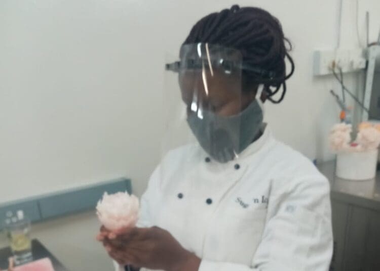 Mercy Ncube making her cakes