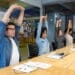 Group of Latin American Workers doing stretching exercises in a business meeting at the office - healthy lifestyle concepts
(Group of Latin American Workers doing stretching exercises in a business meeting at the office - healthy lifestyle concepts
,