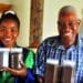 Liza Legodi and her father Lesiba showing off the coffee beans they plant
