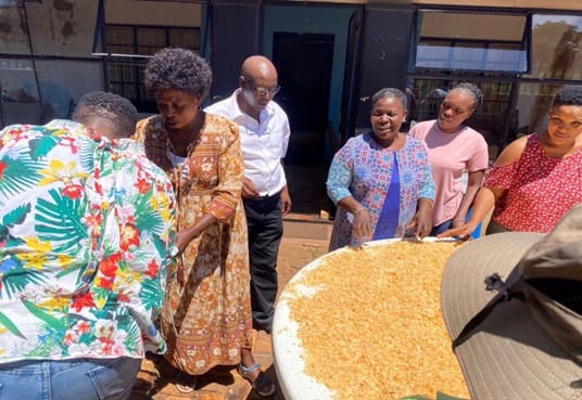 Community members at oyster mushroom farming project
