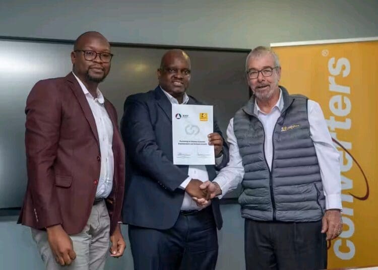 From left, Monde Ndlovu Managing Director of BMF, Mpho Motsei BMF President and co-Founder and CEO Richard Mukheibir of Cash Converters
