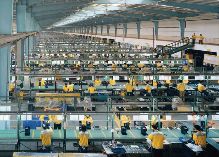 Factory workers in china producing luxurious goods sold around the world.