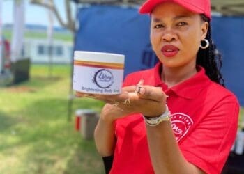 Clementine Phahlamohlaka with one of body scrubs from Ebrey Cosmetics