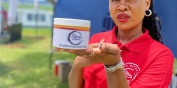 Clementine Phahlamohlaka with one of body scrubs from Ebrey Cosmetics