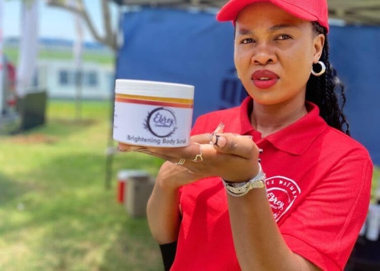 Clementine Phahlamohlaka with one of body scrubs from Ebrey Cosmetics