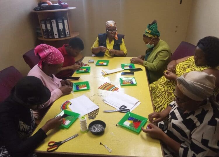 A group of participants at the beads-making workshop gain both craft and entrepreneurial skills to build sustainable ventures