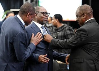 Deputy President Paul Mashatile and President Cyril Ramaphosa share a light moment with Minister of Finance Enoch Godongwana ahead of the 2026 Budget Speech in Cape Town. Photo. Parliament of RSA