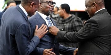 Deputy President Paul Mashatile and President Cyril Ramaphosa share a light moment with Minister of Finance Enoch Godongwana ahead of the 2026 Budget Speech in Cape Town. Photo. Parliament of RSA