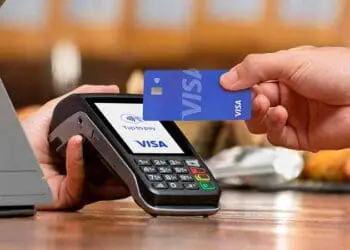 Small businesses charge extra for card transactions to cover bank costs. Photo. VISA