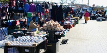 Informal traders keep local economies running despite challenges with costs, permits, and support.