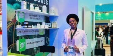Khathutshelo Sephuma showcases Funo Curls hair and skincare products at the Zimbabwe International Trade Fair in Bulawayo.